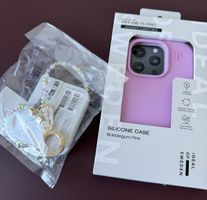 Handyhülle und wristlet strap Ideal of Sweden iPhone 15 Pro