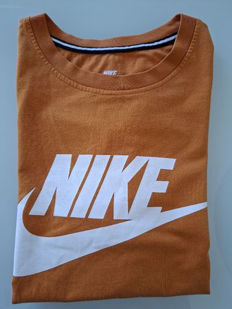 T-shirt Nike orange a col rond et manches courtes, femme
