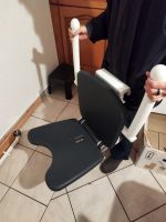 Chaise de douche rabatable état neuf avec barre de fixation