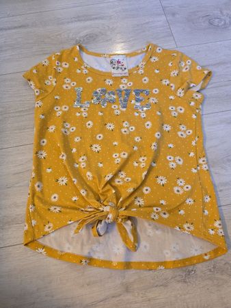 Mädchen T-Shirt mit Wendepailletten Grösse 140 gelb