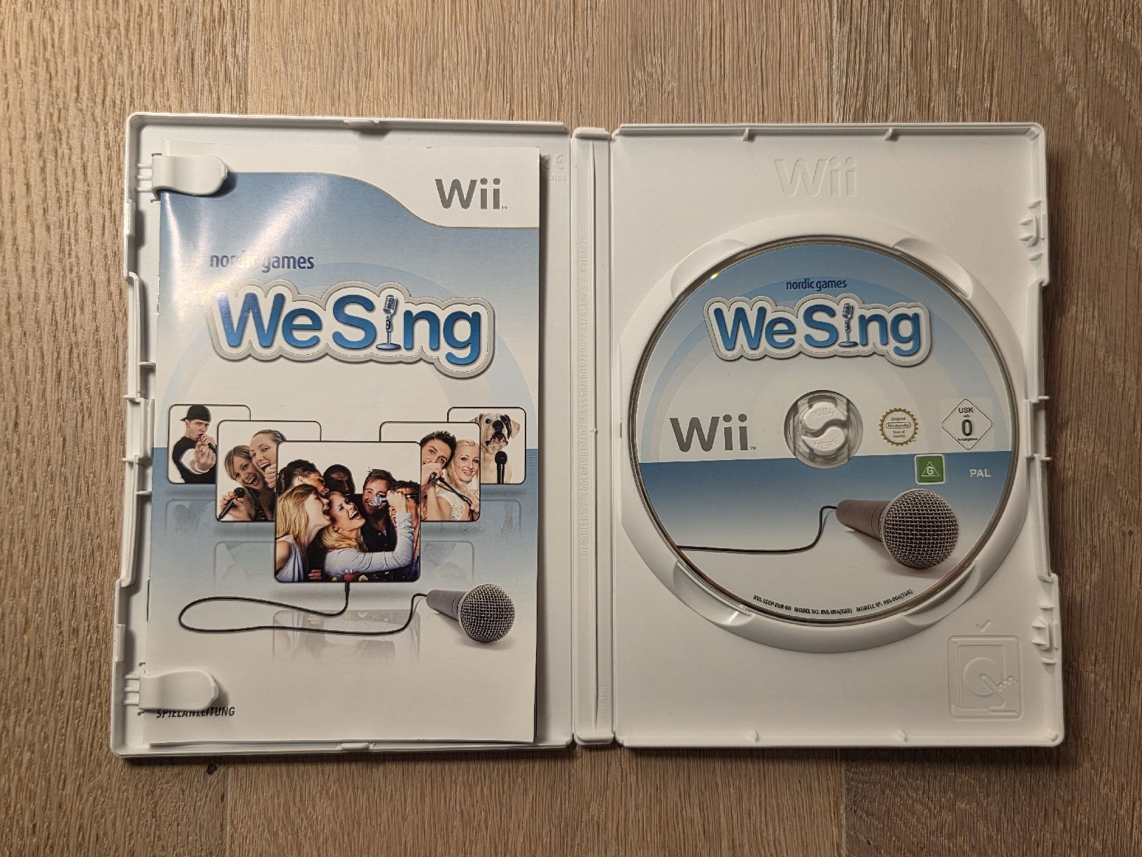 Nintendo Spiele: Wii - We Sing mit Mikrofon – Gebraucht aus Altendorf von sel_x9x5 3