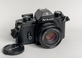 Nikon EM + Nikkor 50mm f/1.8 + Kenlock 35-105mm