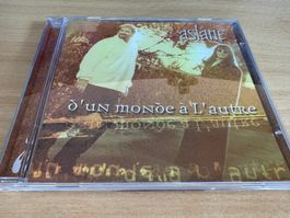Aslane – D'Un Monde À L'Autre