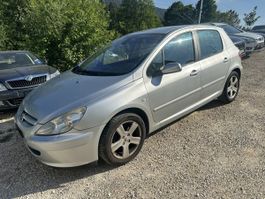 Peugeot 307 1.6 essence gris 5 portes 1.587 cm3 80kW