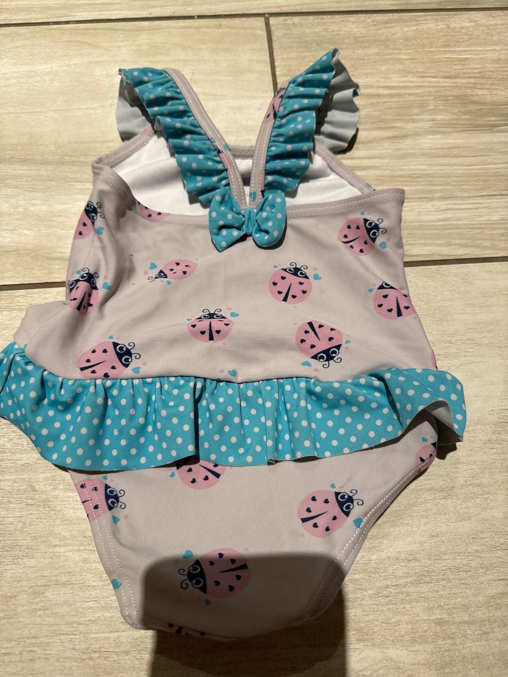 Badehosen & -kleider: Badekleid Marienkäfer 80 eher 74 – Gebraucht aus Gelterkinden von Familienferien 1