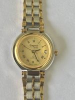 Élégante montre Diagonal Genève Quartz, style bicolore