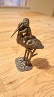 Bronce Figur Storch mit Bube