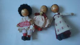 3 alte Holzpüppchen