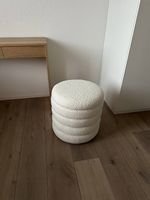 Weißer Pouf mit Aufbewahrungsfunktion