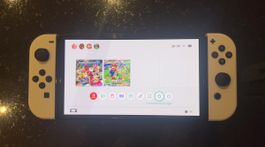 Nintendo Switch OLED Konsole mit Spielen und Zubehör