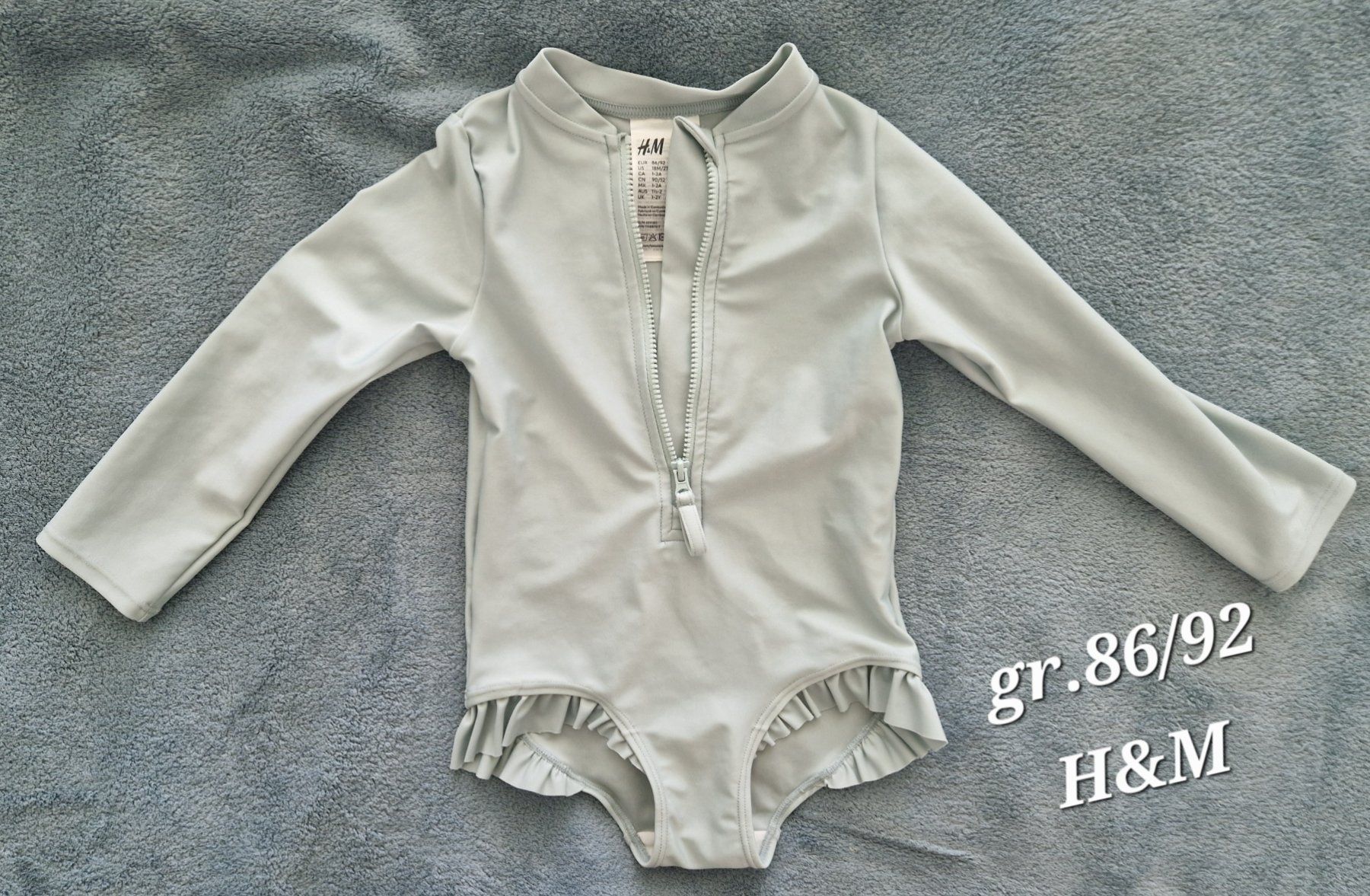 H&M Badehosen & -kleider: Badeanzug mit Langarm grösse 86/92 – Gebraucht aus Heimberg von Eleanor20