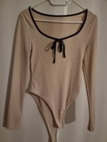 Eleganter Body mit Schleife, Langarm