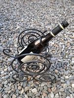 Supporto vino rotante in ferro batuto  sommelier