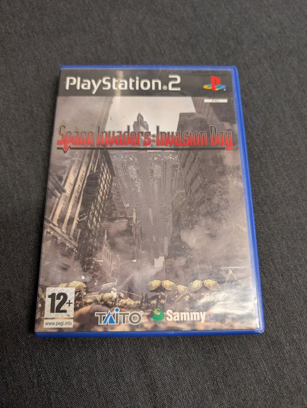Jeux: Space invaders invasion day Sony playstation 2 – D'occasion à Giubiasco par Ticinerd