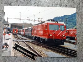 MGB HGe 4/4 II mit Personenzug - Foto