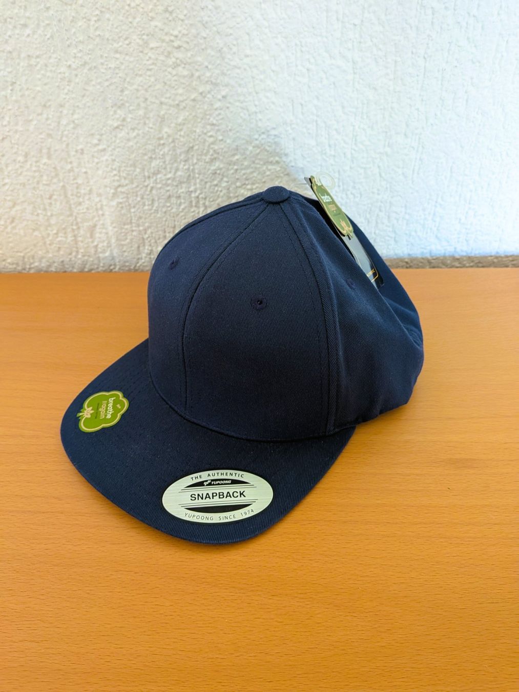 Hüte, Mützen & Caps: Yupoong Snapback Organic Cotton Navy – Neu und originalverpackt aus Pfäffikon SZ von RainerZuefall