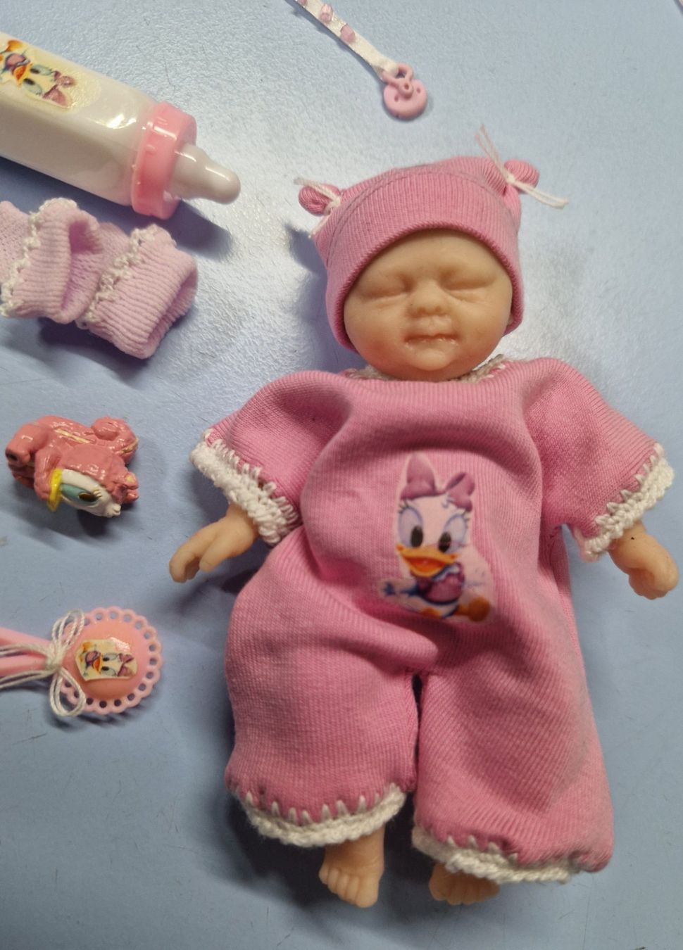 Bambole: Mini bébé en silicone  12 cm Thème DAISY  NEUF – Nuovo e nell'imballaggio originale da St-Imier venduto da goodber 3