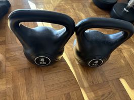 Haltères noirs 4 kg l'unité bon état