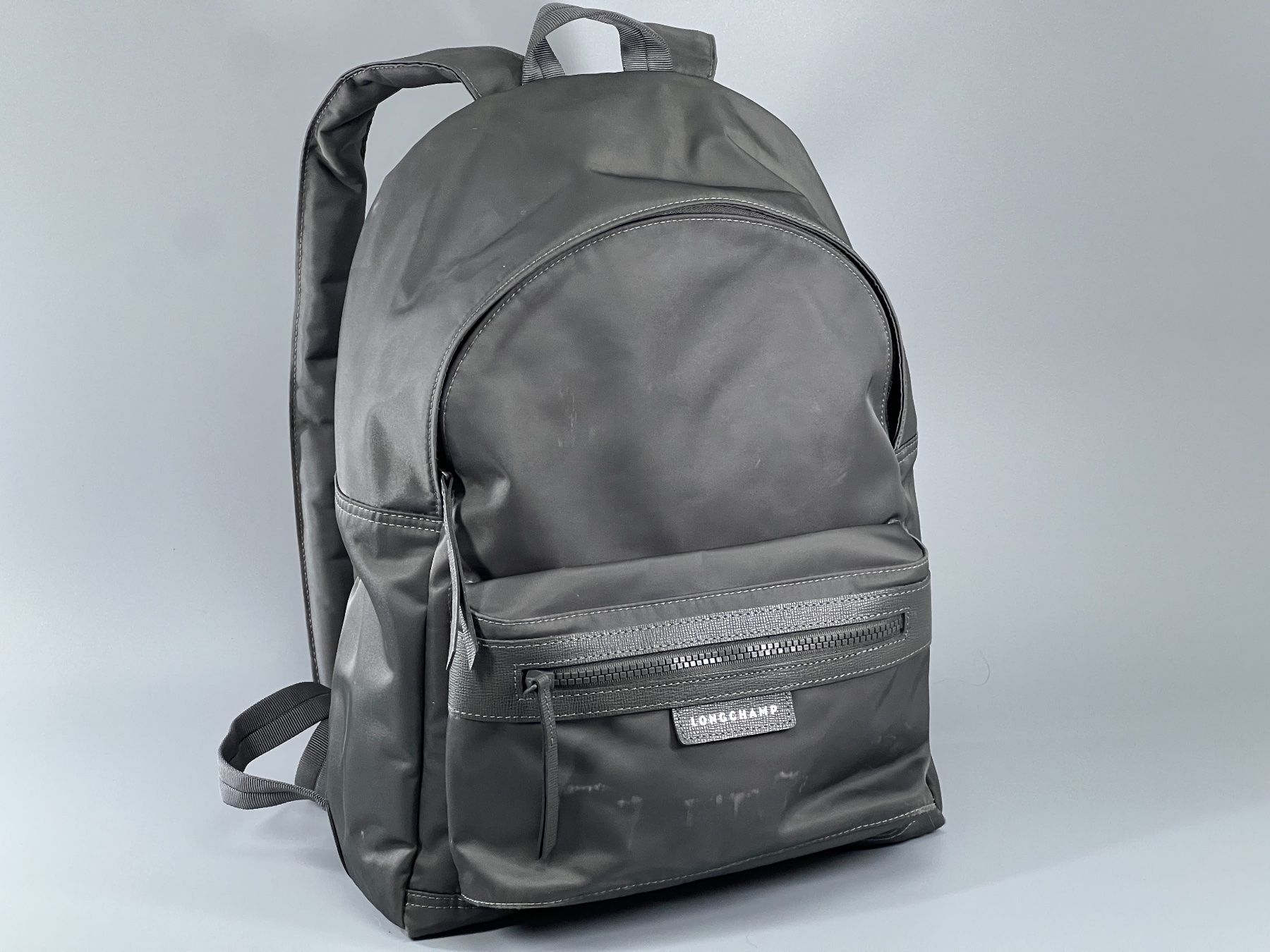 Longchamp Zaini: Longchamp Rucksack / Backpack Grau – Usato da Sennhof venduto da Johnbest