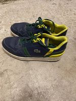 Baskets LACOSTE enfant p. 36, cuir