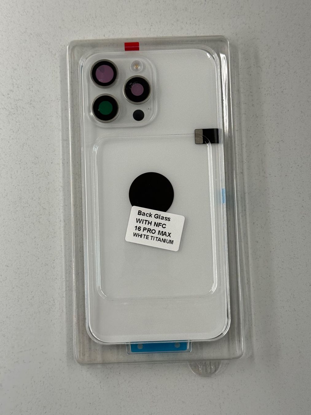 Apple Telefoni cellulari / Smartphones: Vitre Arrière pour iPhone 16 Pro Max avec NFC | Flash – Nuovo e nell'imballaggio originale da Zug venduto da ElPhone 2