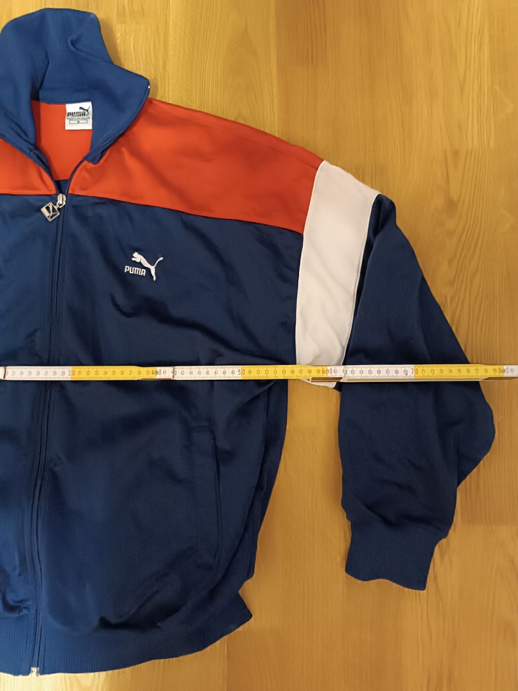 Puma Giacche: Puma Trainingsjacke Blau Orange Weiss Grösse L – Usato da Basel venduto da tracka 1