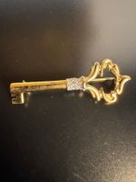 Nina Ricci Brosche „Schlüssel“ Goldfarben