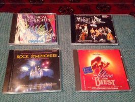 4 CD's verschiedener Musikrichtungen