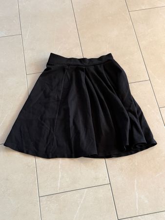Eleganter schwarzer A-Linien Rock