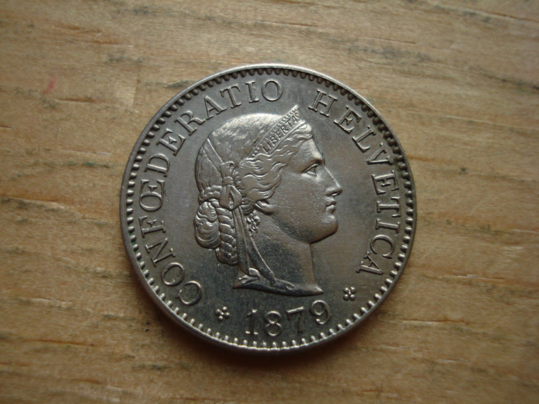 Tutti le monete: (H6) 5 Rappen 1879  UNZ – Usato da Erlach venduto da Net-Coins