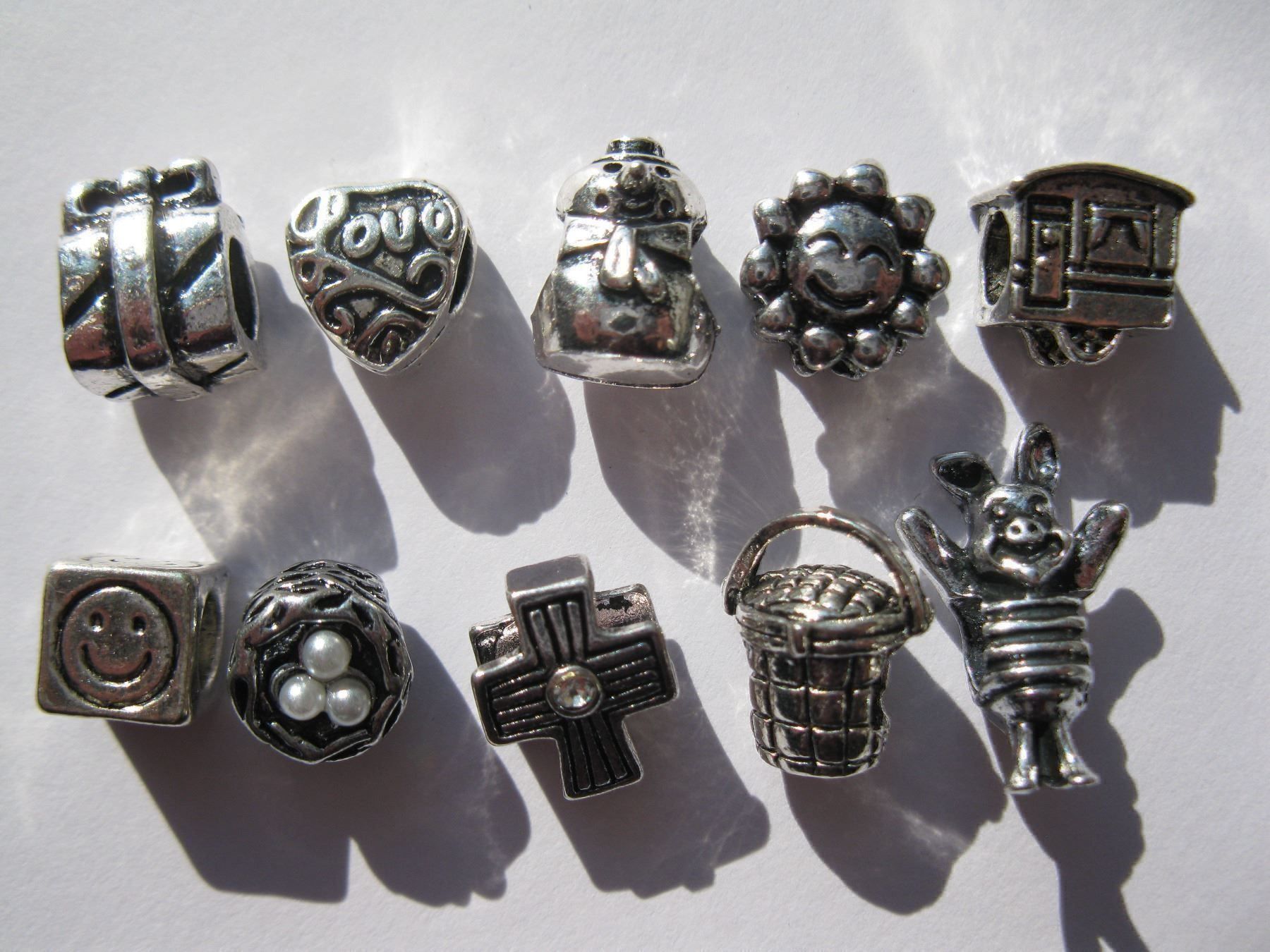 Perle (finte): 10 Metallperlen, Beads, Grosslochperlen mit Motiv – Nuovo e nell'imballaggio originale da St. Margarethen TG venduto da LuanaKa