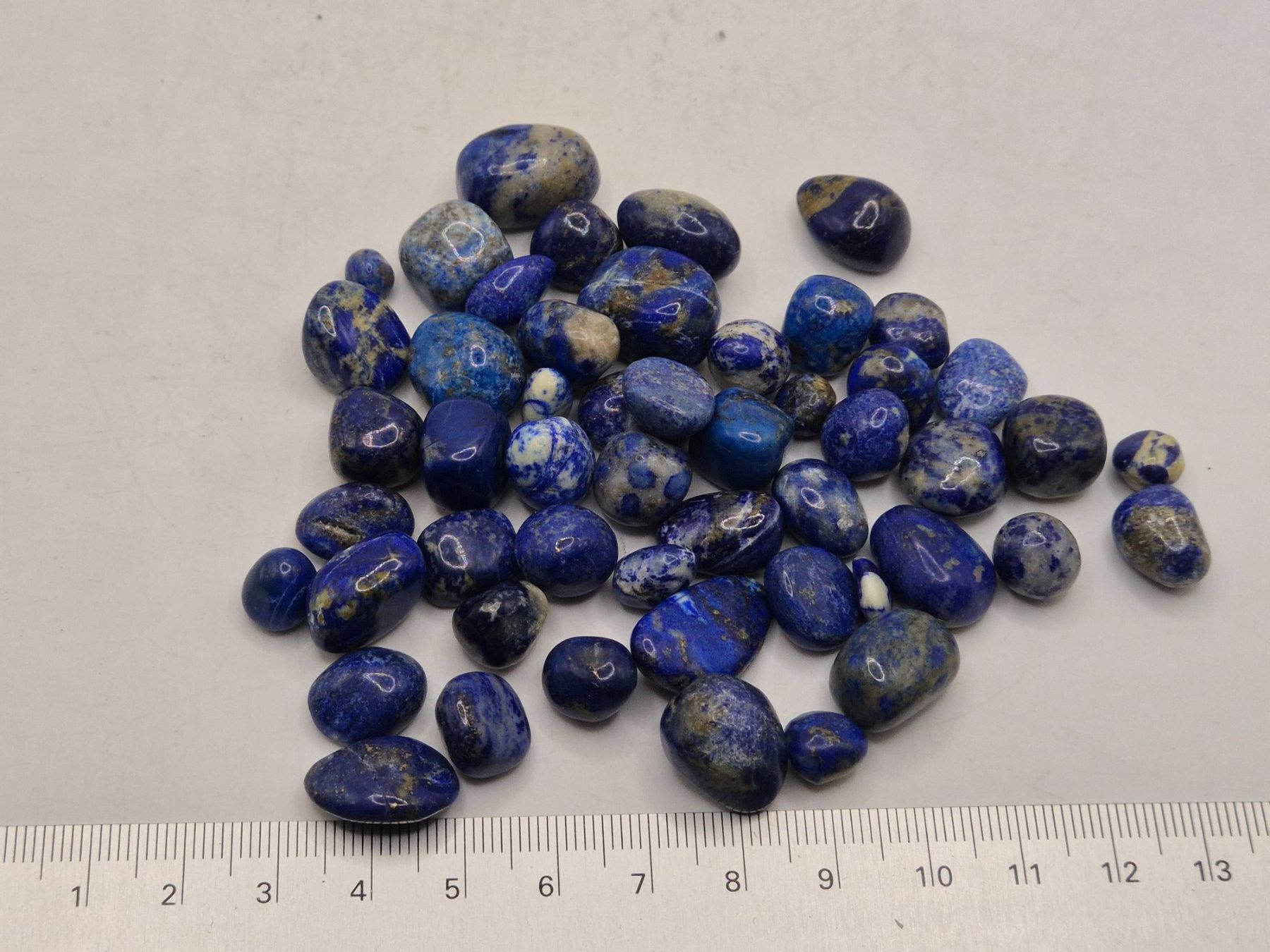 Minerali & Pietre curative: Trommelsteine Lapislazuli klein – Nuovo e nell'imballaggio originale da Winterthur venduto da LukasMineralienOase 1