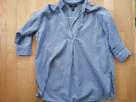 Verschiedene Kleidung für schwangere Frauen