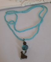 Langes Echtes Steincollier mit.Kleinem Vogel