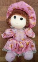 Stoffpuppe mit rosa Kleid und Sternenmuster in Top Zustand