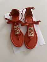 Sandali Coach arancioni taglia 6( 38,5)con logo dorato usati