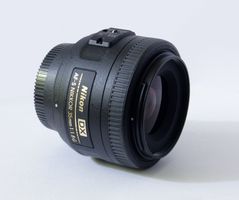 Nikon 35mm F/1.8+ UV Filter+ Metallic Hood+3 month guarantee
