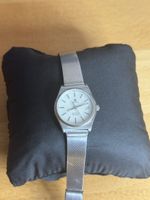 Montre Tissot quartz argenté bon état