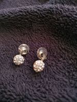 Boucle d'oreille avec strass