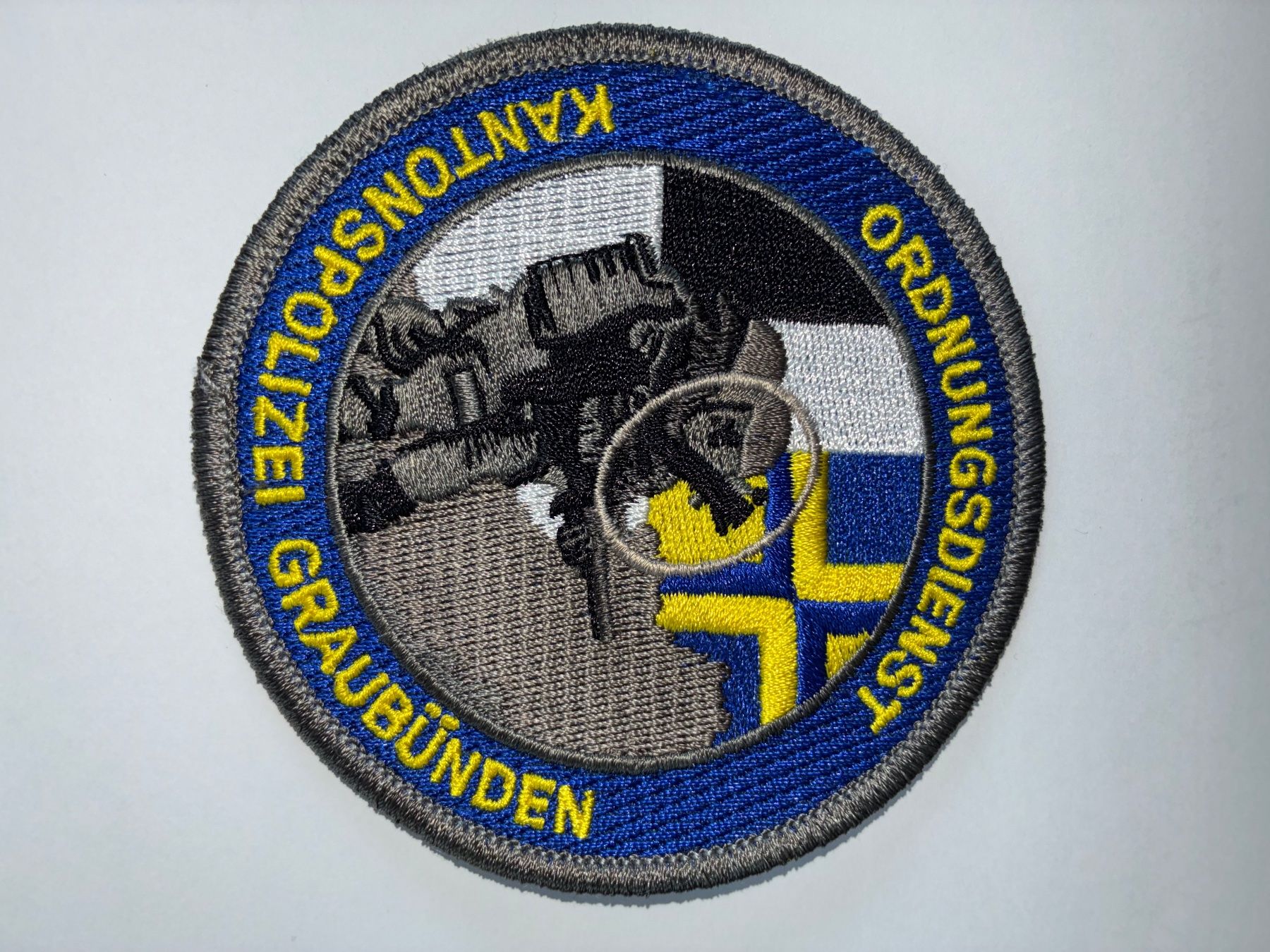 Schweizer Armee Toppe: Original Patch Kantonspolizei Graubünden Ordnungsdienst – Usato da Oberiberg venduto da reimet
