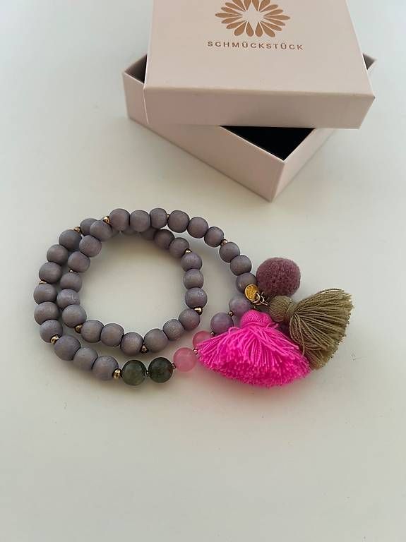 Bracciali & Braccialetti: Armschmuck Holz/Stein mit Quasten – Usato da Oberbueren venduto da marolegi