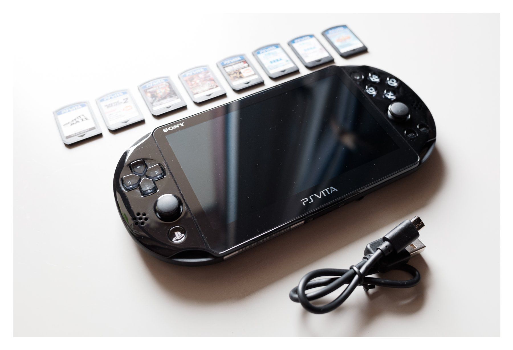 Sony Konsolen: Sony PS Vita 2000 + 8 games + accessories – Gebraucht aus Oberwil b. Zug von  3