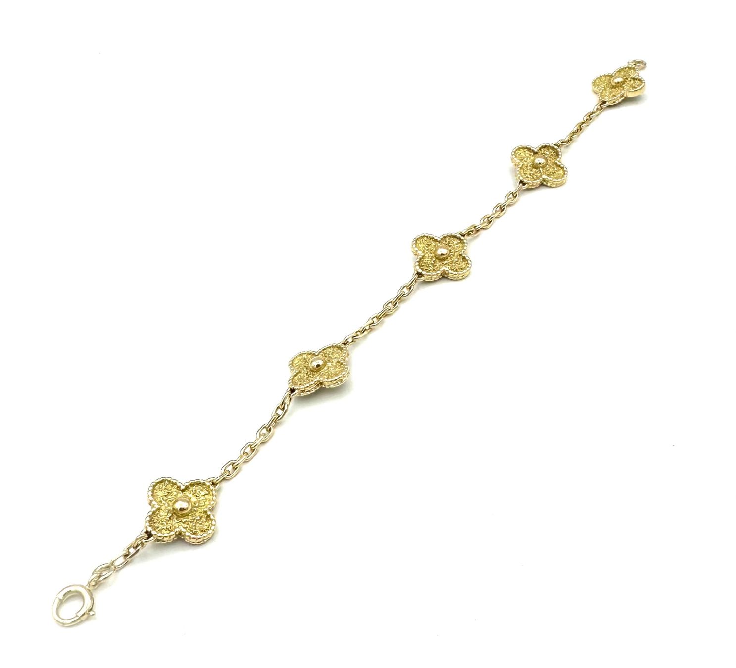 Van Cleef Bracciali & Braccialetti: VAN CLEEF. Collection "Vintage Alhambra", bracelet or jaune – Usato da Renens VD venduto da Diademe.sarl 1