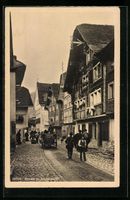 Andermatt, Fuhrwerk auf einer belebten S
