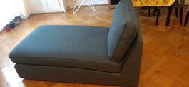 Fauteuil méridienne bleu foncé, état d'occasion. + 2 housses
