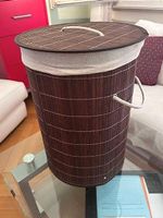 Panier à linge en bambou avec couvercle  Très bon état
