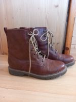 Bottines brunes à lacets et fermeture éclair