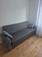 Schlafsofa grau mit Bettkasten und Kissen guter Zustand