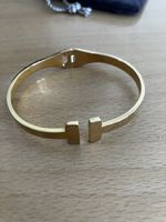 Armreif und Ring goldfarben mit Beutel 2-teiliges Set