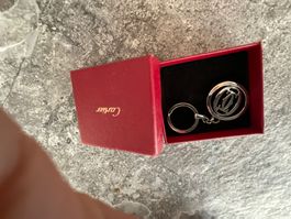 Porte-clés Cartier logo argenté neuf dans sa boîte